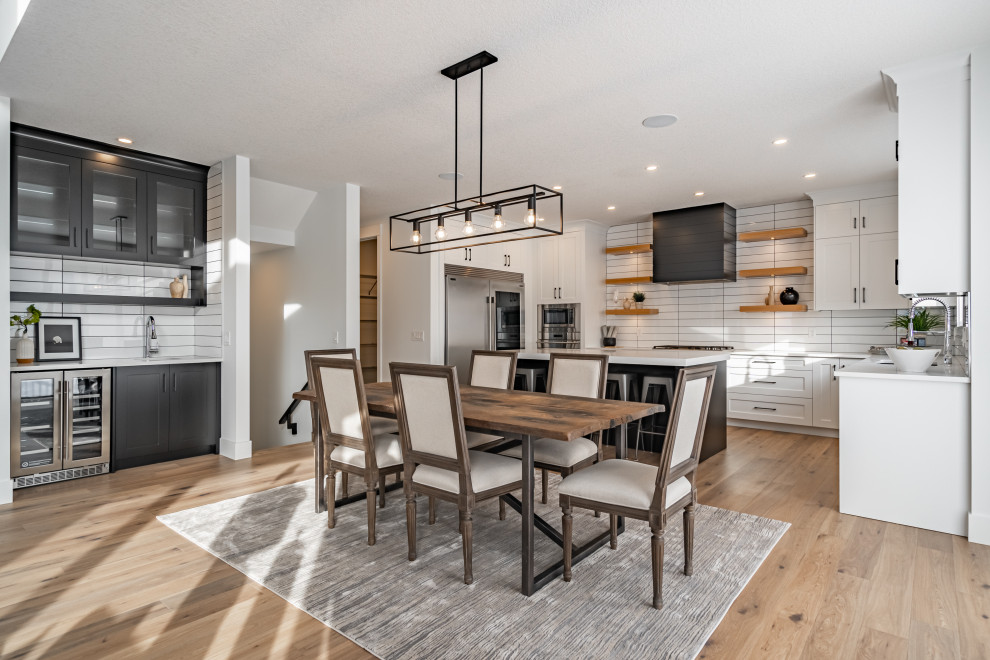 Transitional home design photo in Calgary