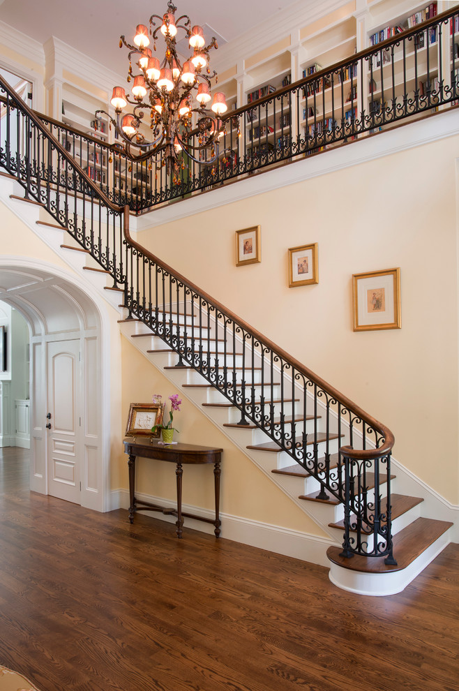 Inspiration for a mid-sized traditional painted wood l-shaped staircase in Atlanta with wood risers and mixed railing.