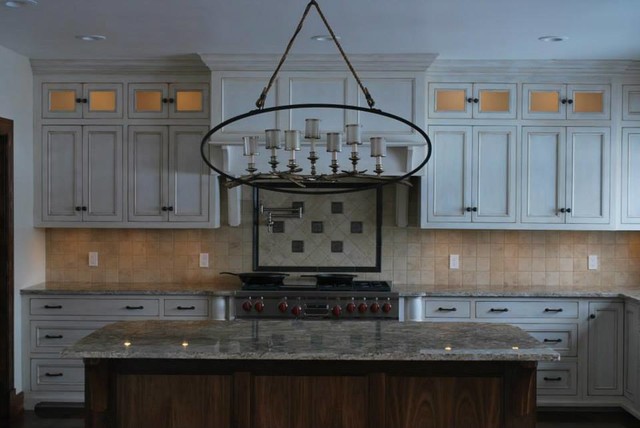 9 Ceilings Allowed Us To Add An Upper Row Of Lighted Cabinets