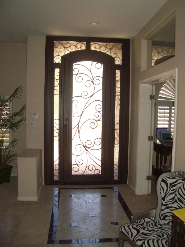Mid-sized transitional ceramic tile front door photo in Phoenix with beige walls and a medium wood front door
