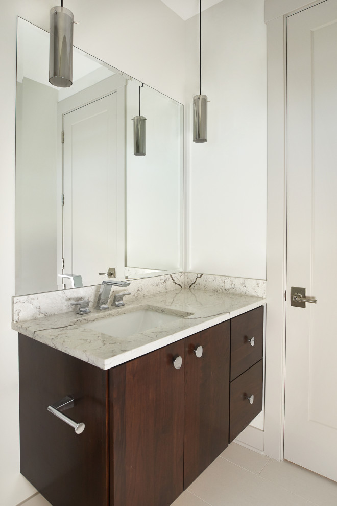 Photo of a modern bathroom in Grand Rapids with flat-panel cabinets, brown cabinets, white walls, porcelain floors, marble benchtops, white floor, beige benchtops, a single vanity and a floating vanity.