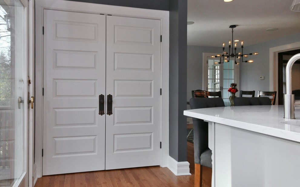 Example of a transitional kitchen design in New York