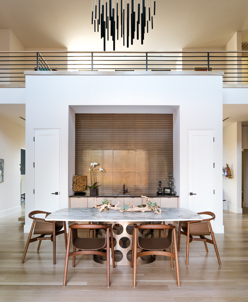 Inspiration for a contemporary open plan dining in Dallas with white walls, light hardwood floors and beige floor.
