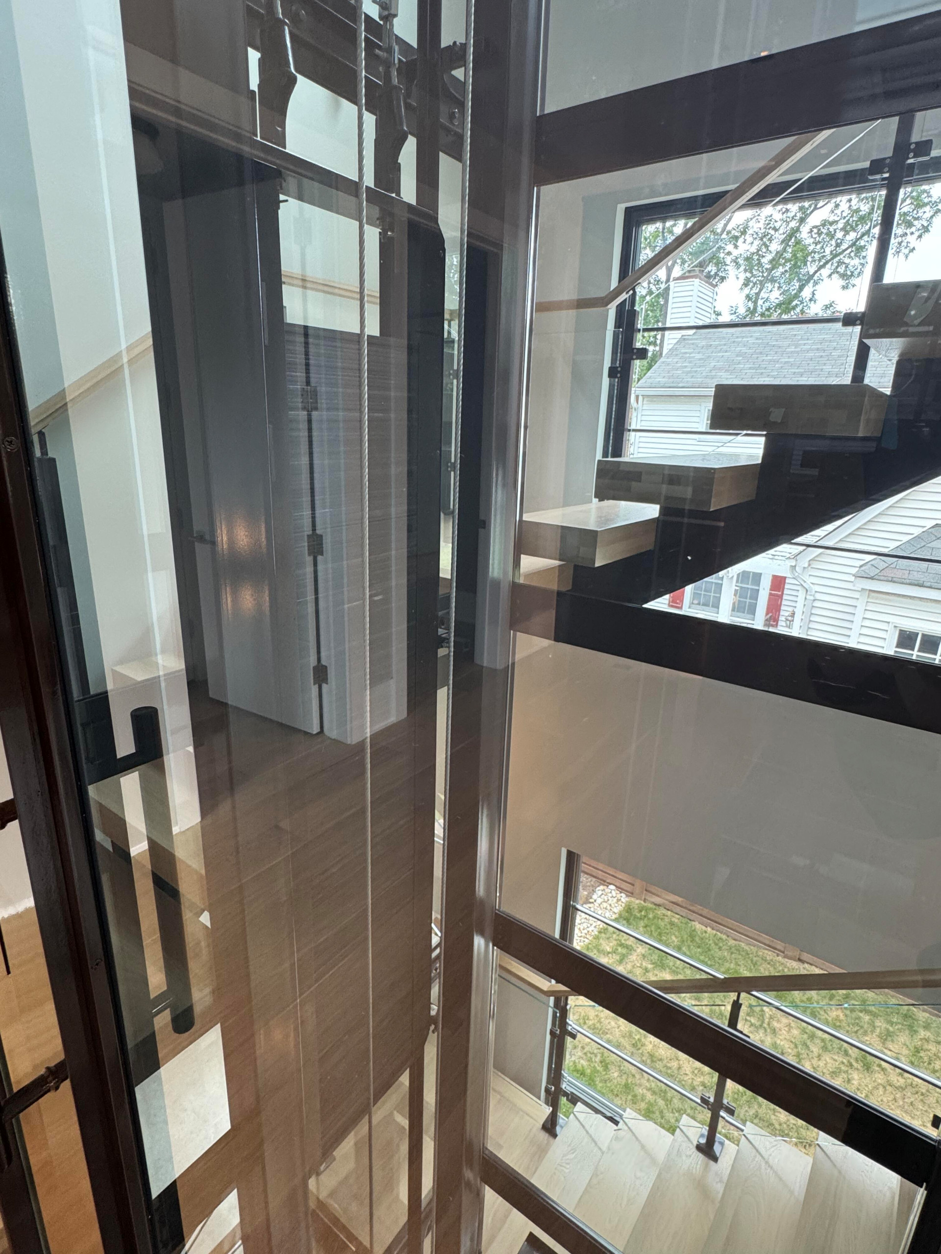 136_Modern Mono-Beam Encircling Glass Elevator, Bethesda, MD 20814