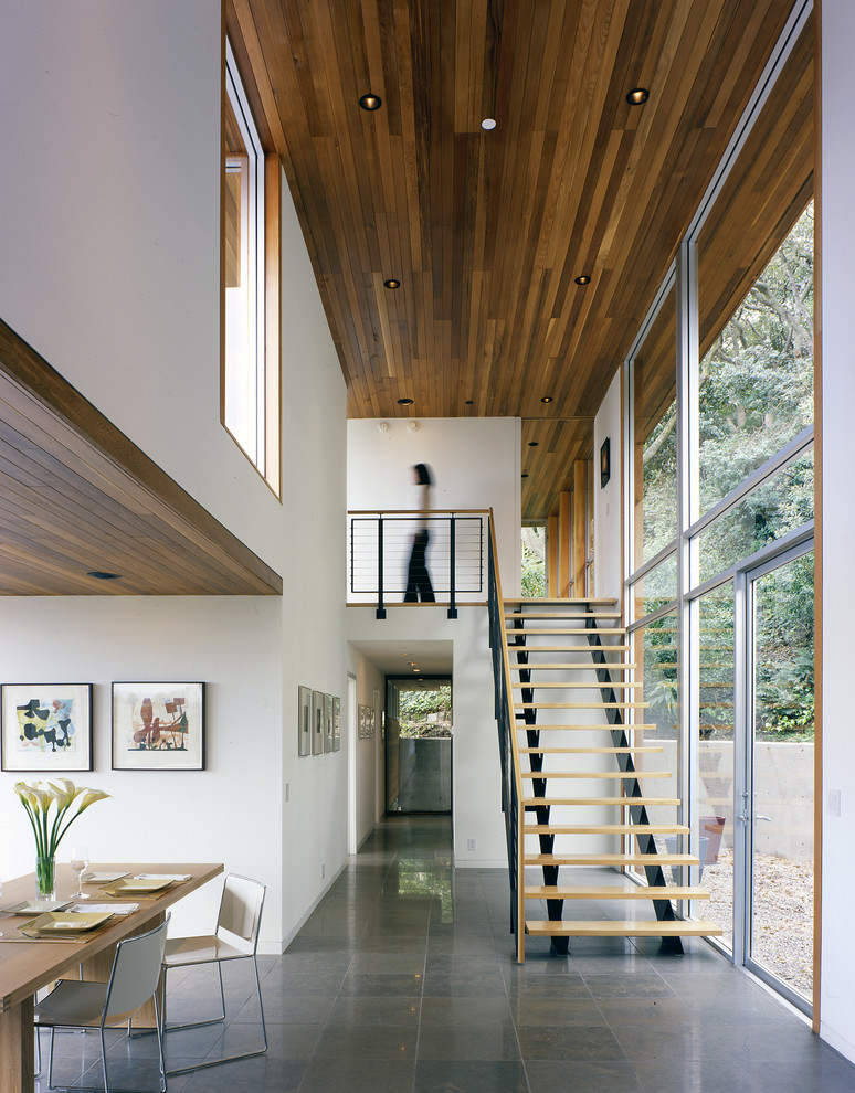 Inspiration for a mid-sized modern wood straight staircase in San Francisco with open risers.