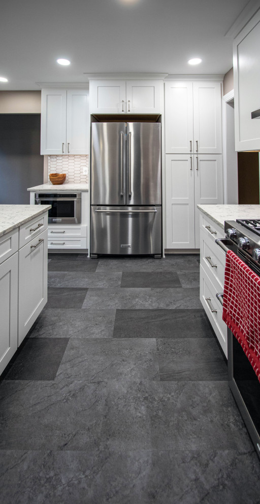 Grey and White Shaker Kitchen with Quartz Countertops and Picket-Style ...