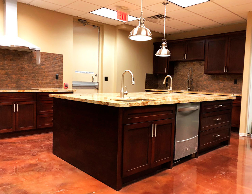 Traditional kitchen in Houston with a single-bowl sink, beaded inset cabinets, brown cabinets, granite benchtops, orange splashback, with island, orange floor and beige benchtop.