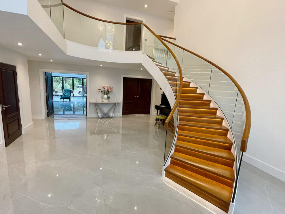 Inspiration for a large modern curved staircase in Other.