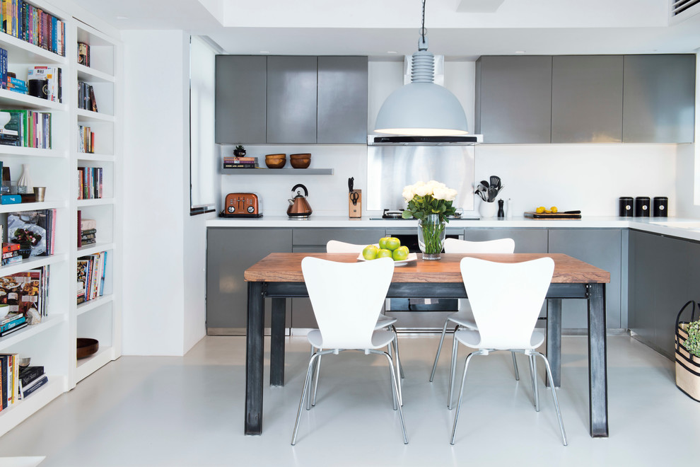 Inspiration for a small contemporary l-shaped eat-in kitchen in Hong Kong with flat-panel cabinets, grey cabinets, metallic splashback and no island.