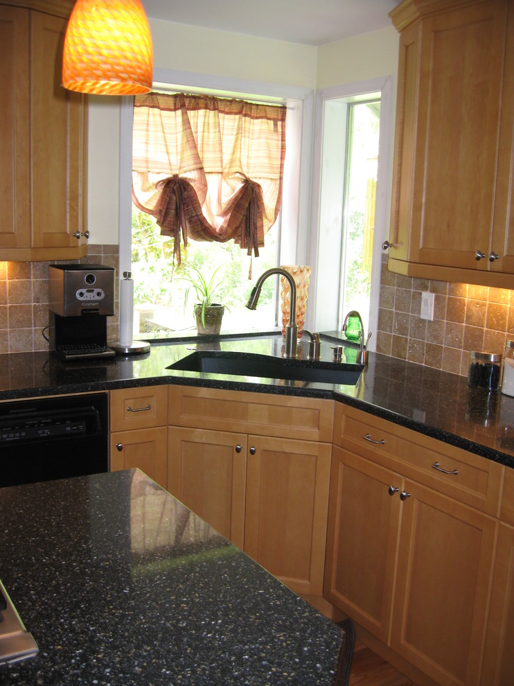 Example of a transitional kitchen design in Seattle