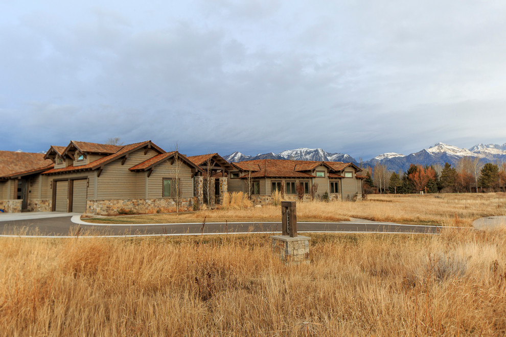 Inspiration for a transitional exterior home remodel in Jackson