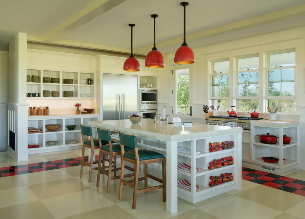 Design ideas for a mid-sized country galley open plan kitchen in Other with a farmhouse sink, open cabinets, white cabinets, stainless steel appliances, painted wood floors, with island, beige floor, beige benchtop and recessed.