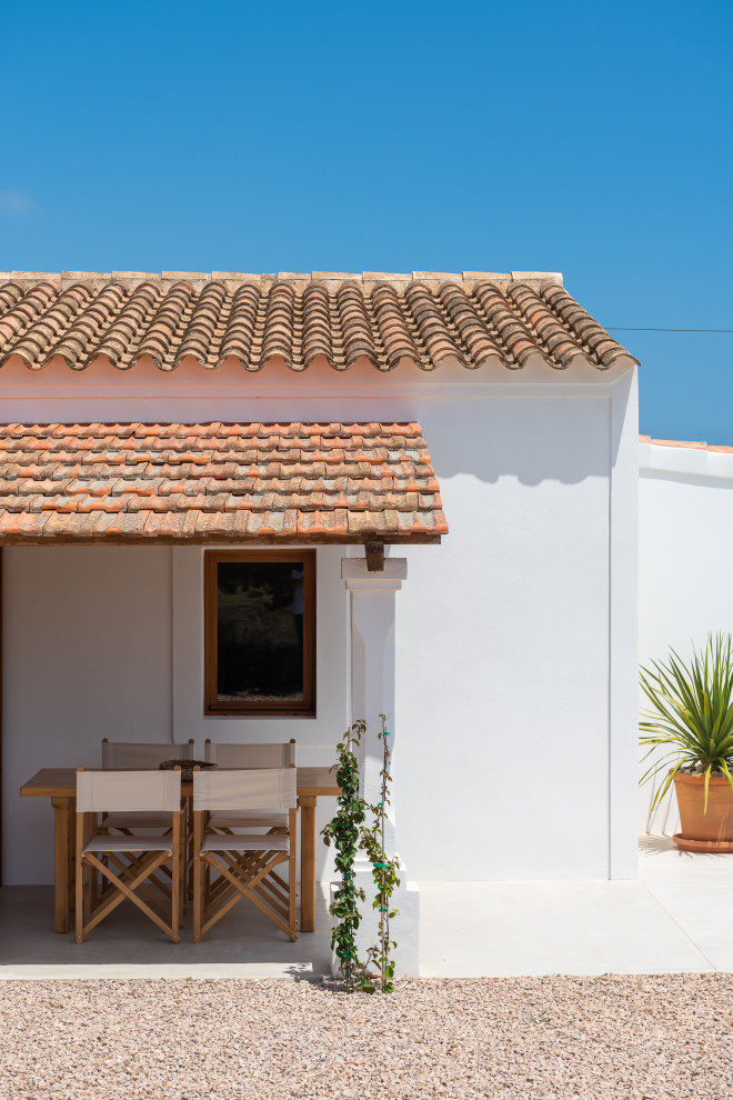 Modelo de terraza in patio trasero With losas de hormigón
