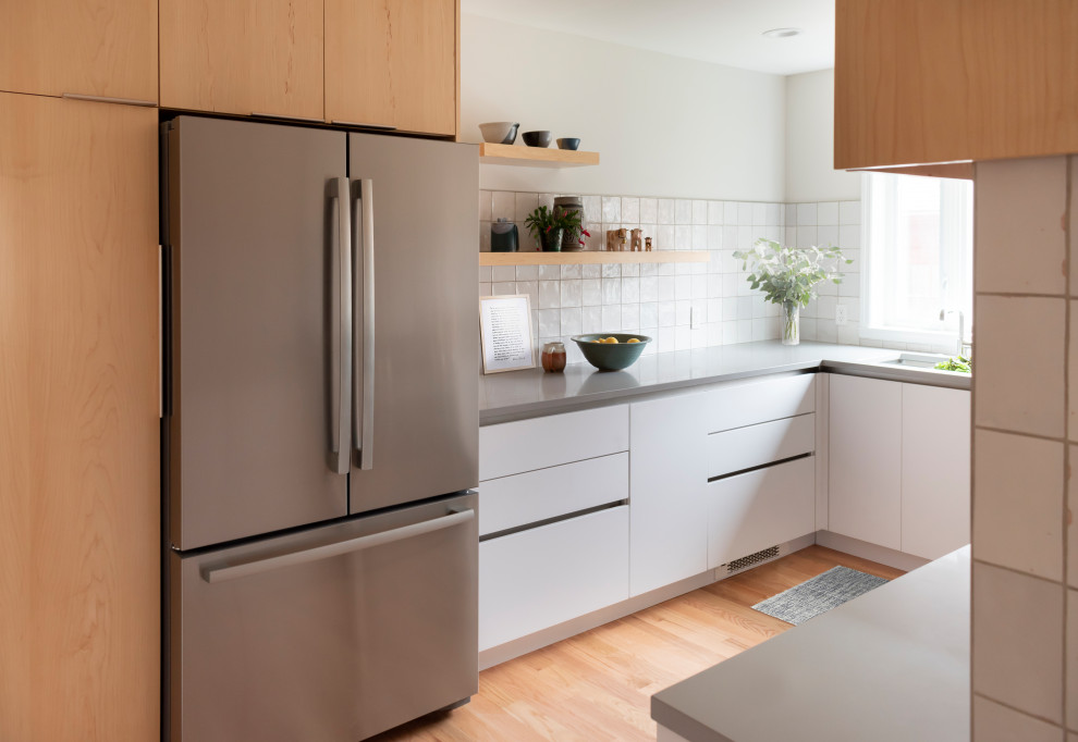 This is an example of a small scandinavian kitchen in Chicago.