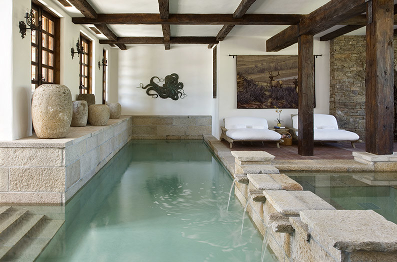 Mid-sized mountain style indoor custom-shaped pool house photo
