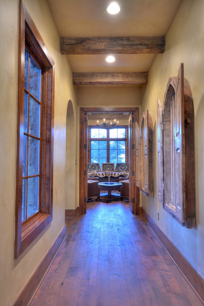 Hallway - rustic hallway idea in Austin