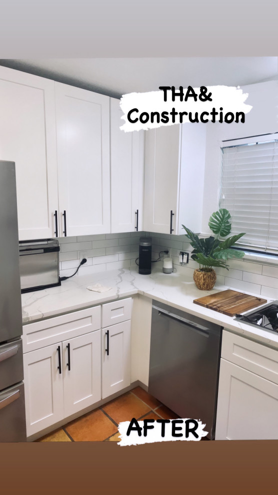 This is an example of a mid-sized modern l-shaped kitchen in Austin with a drop-in sink, shaker cabinets, white cabinets, quartz benchtops, white splashback, subway tile splashback, stainless steel appliances, terra-cotta floors, no island, red floor, white benchtop and timber.