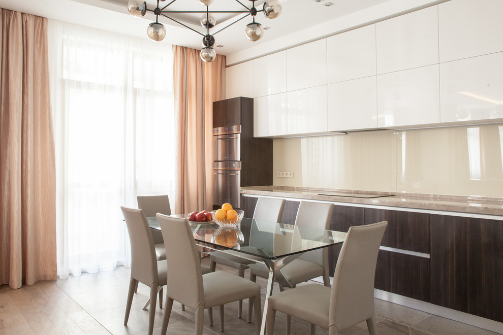 Photo of a contemporary single-wall kitchen in Moscow with flat-panel cabinets, dark wood cabinets, beige splashback, glass sheet splashback, stainless steel appliances, no island, beige floor and beige benchtop.