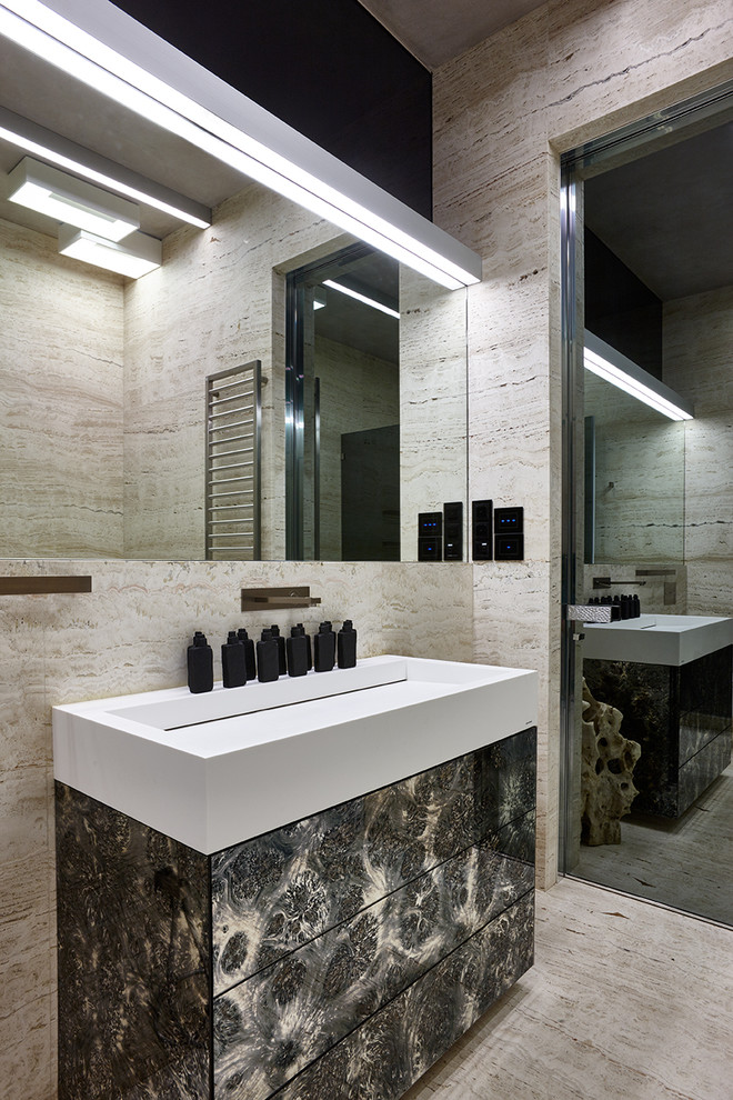 Design ideas for a contemporary master bathroom in Moscow with flat-panel cabinets, beige tile, marble floors, beige floor, an integrated sink, a freestanding tub, a corner shower, a wall-mount toilet, travertine and a hinged shower door.