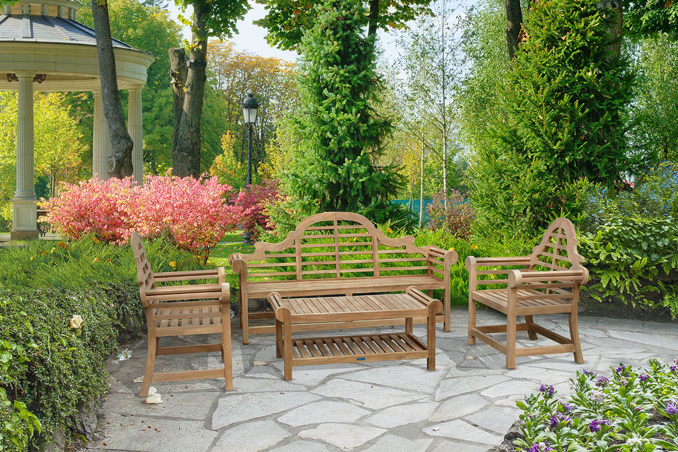 Design ideas for an expansive traditional garden in Surrey.