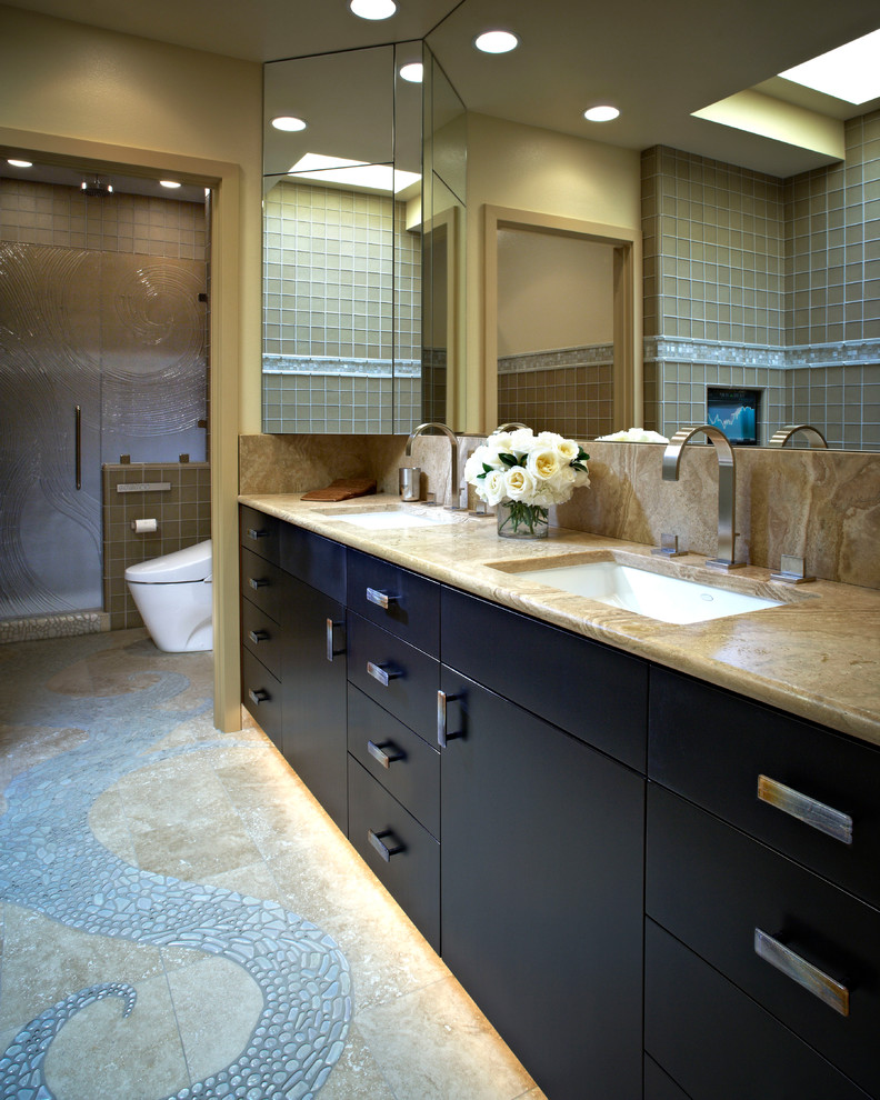 This is an example of a large contemporary master bathroom in Portland with a drop-in sink, black cabinets, granite benchtops, beige tile and pebble tile.