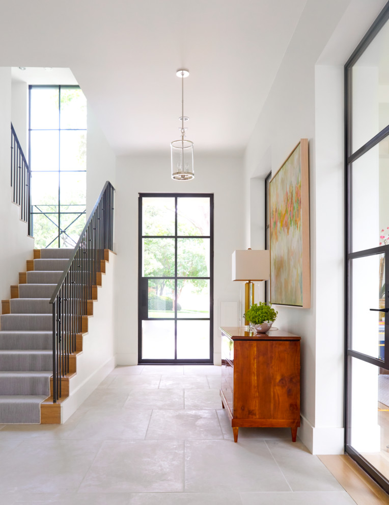 Photo of a transitional entryway in Dallas.