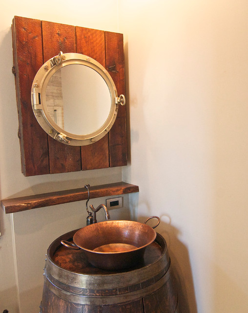 barrel vanity and porthole medicine cabinet - rustic - bathroom
