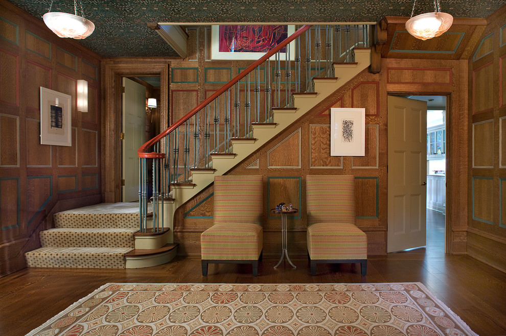 Inspiration for a traditional carpeted l-shaped staircase in New York with carpet risers.