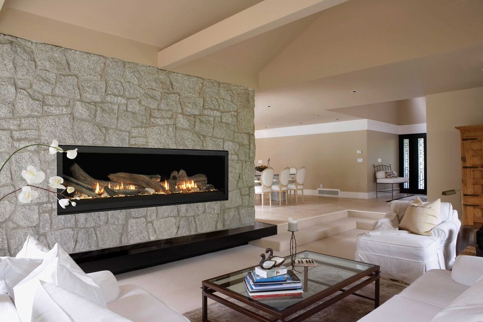 Photo of a large contemporary formal open concept living room in Calgary with beige walls, carpet, a ribbon fireplace, a stone fireplace surround and no tv.
