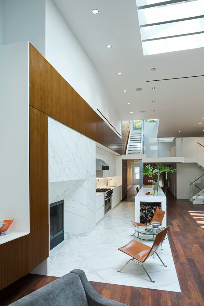 Photo of a large contemporary kitchen in Los Angeles with medium hardwood floors.