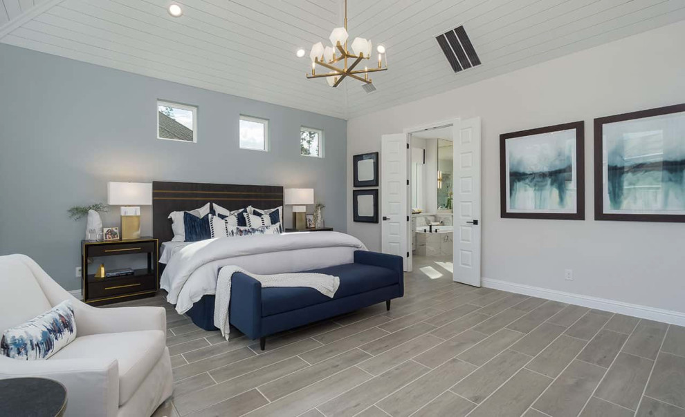 На фото: хозяйская спальня в современном стиле с серыми стенами, полом из керамической плитки, серым полом и сводчатым потолком