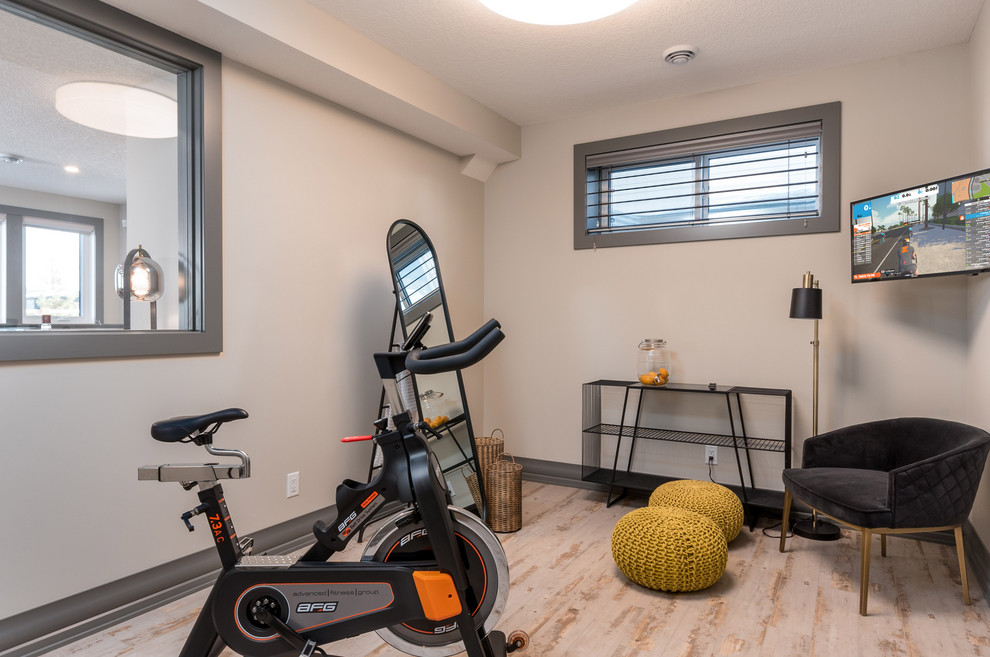 Example of a transitional home design design in Calgary