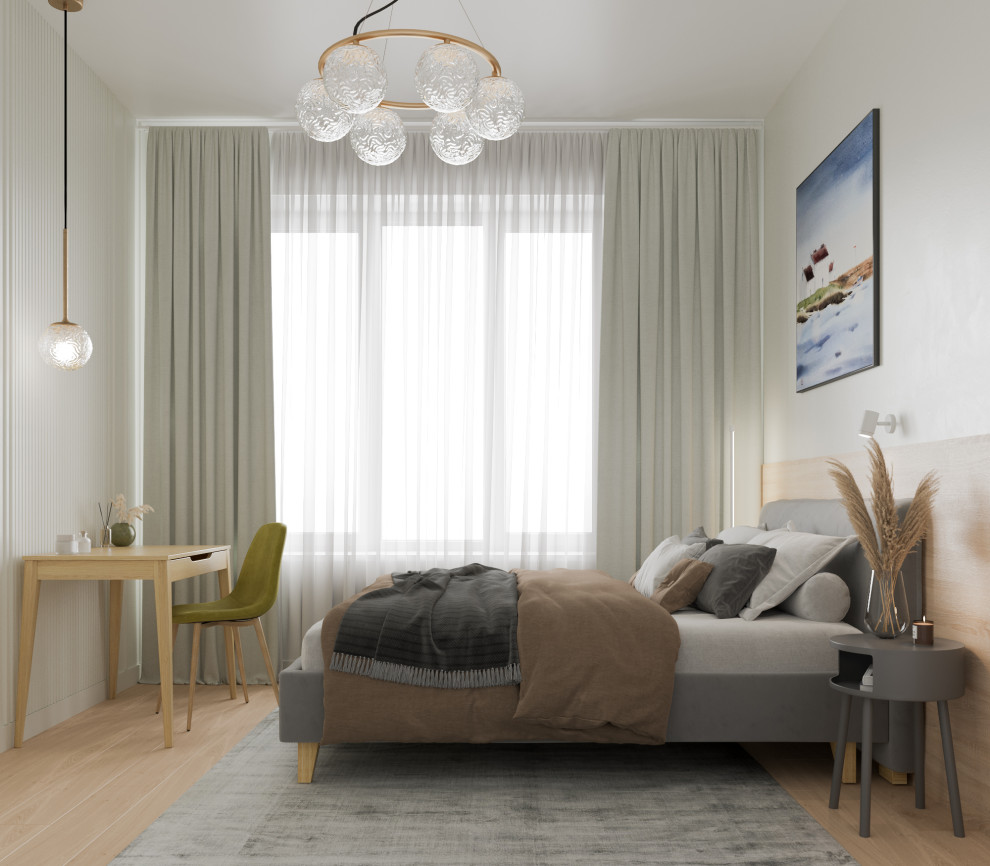 Спальня, вид на кровать и рабочий стол