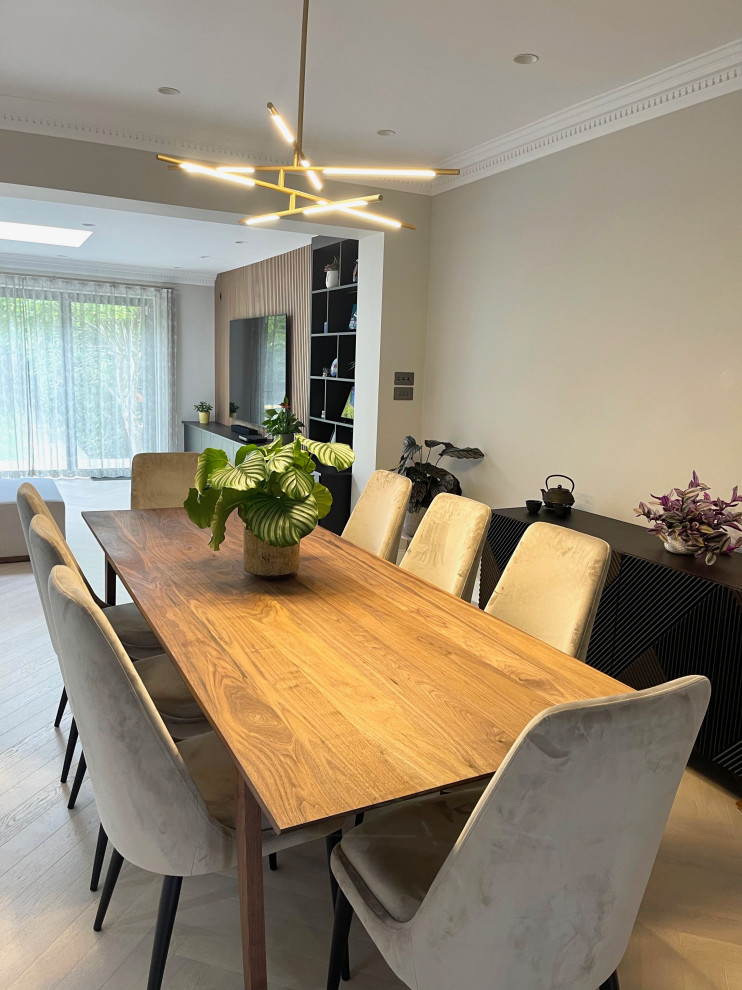 Design ideas for a modern dining room in Hertfordshire.