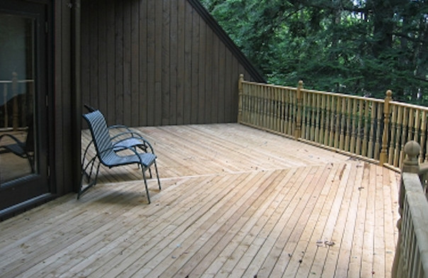 Inspiration for a side yard balcony deck remodel with no cover