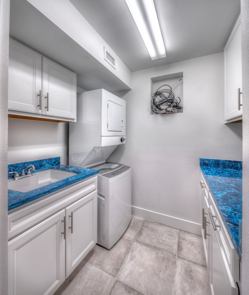 Photo of a beach style laundry room in Tampa.