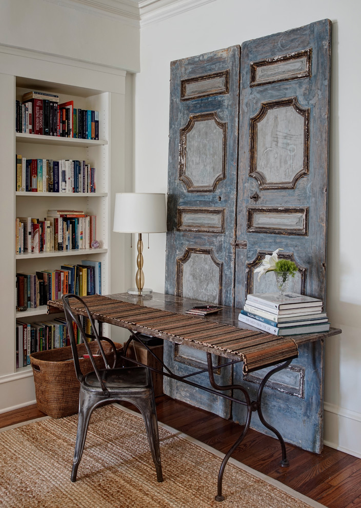 Inspiration for a traditional home office in Chicago with white walls, dark hardwood floors and a freestanding desk.