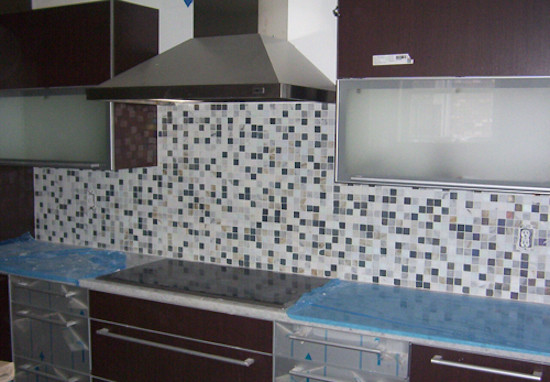 Example of a mid-sized classic kitchen design in Atlanta with multicolored backsplash and mosaic tile backsplash
