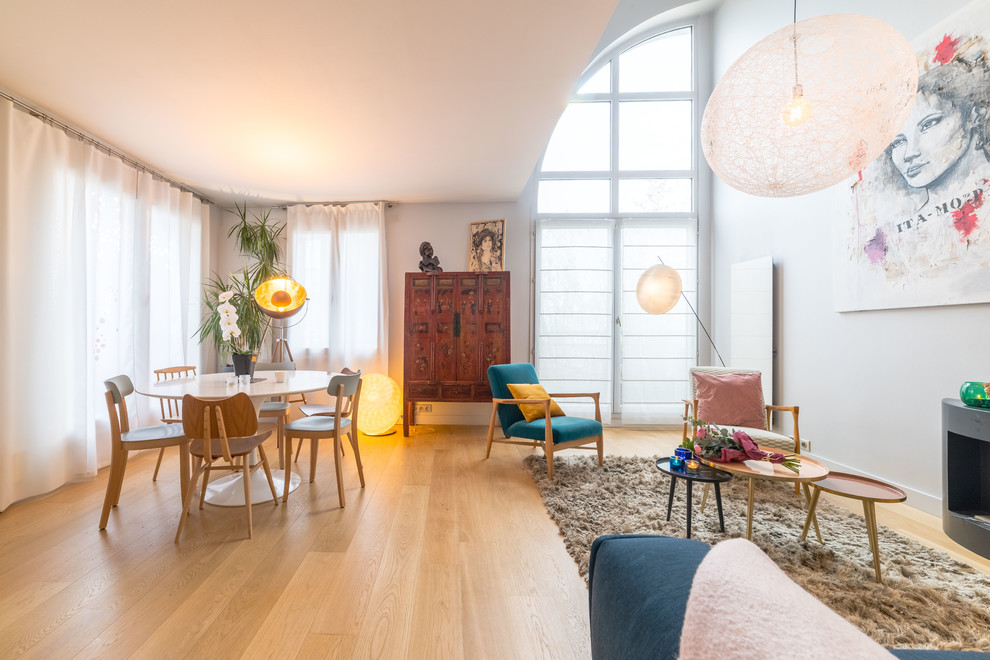 This is an example of a large scandinavian family room in Paris.