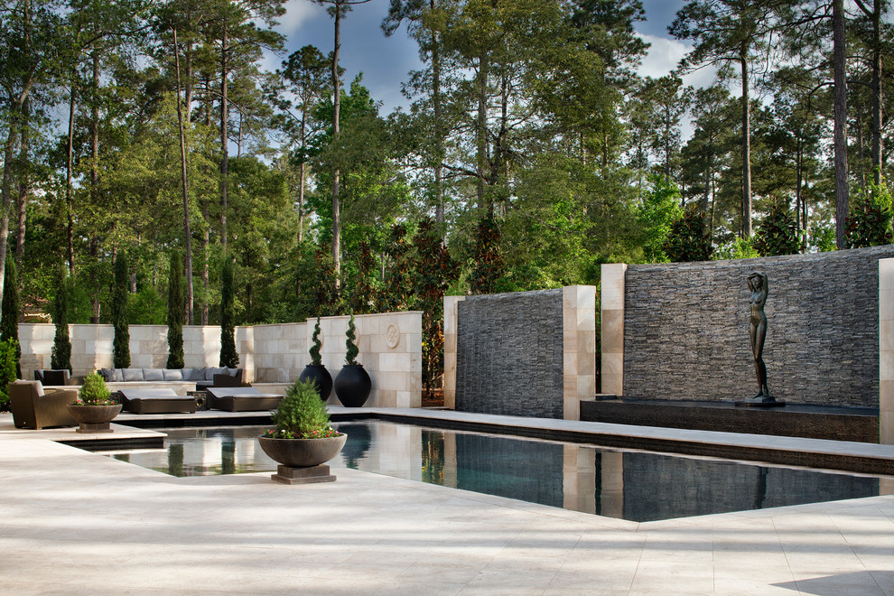 Inspiration for a huge transitional backyard custom-shaped pool fountain remodel in Houston
