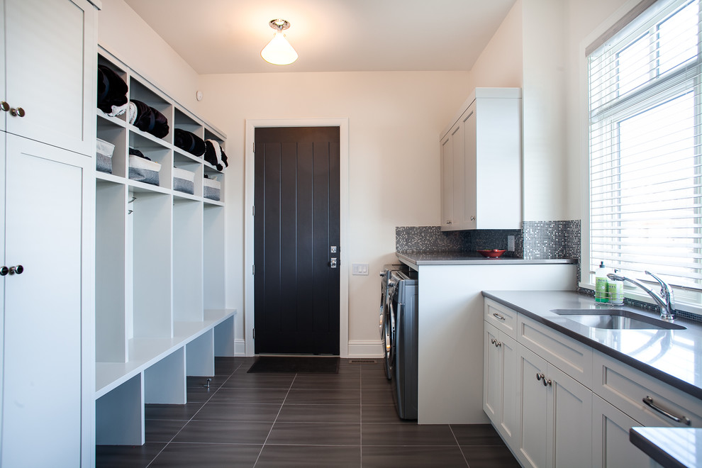 Inspiration for a transitional laundry room in Calgary.