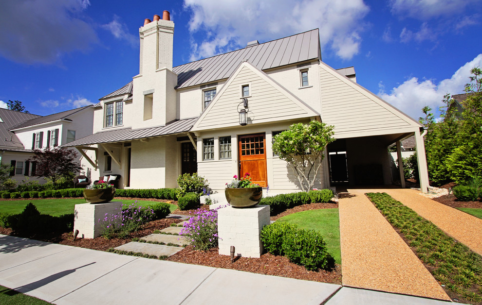 Photo of a transitional two-storey white exterior in Atlanta.