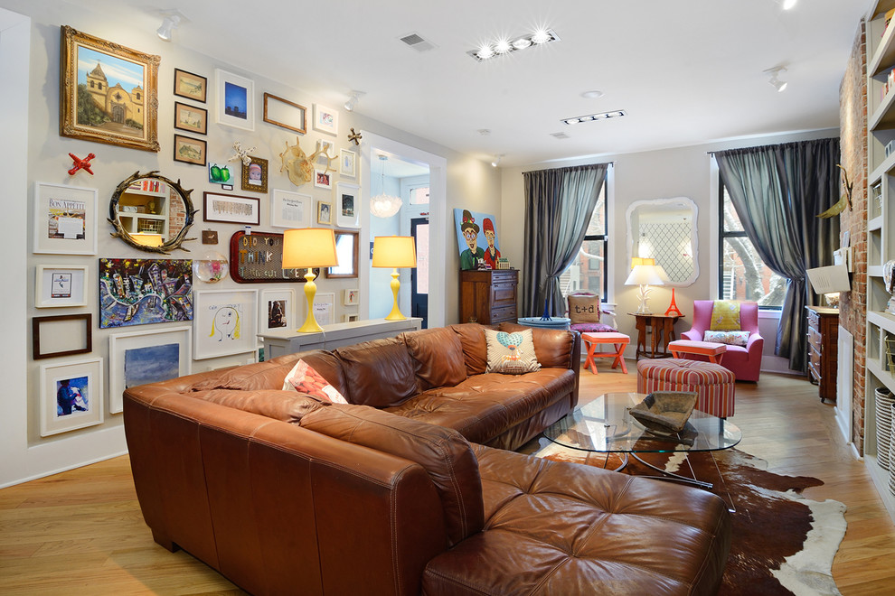 Example of an eclectic family room design in New York