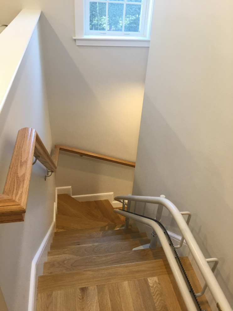 Example of a transitional home design design in Boston