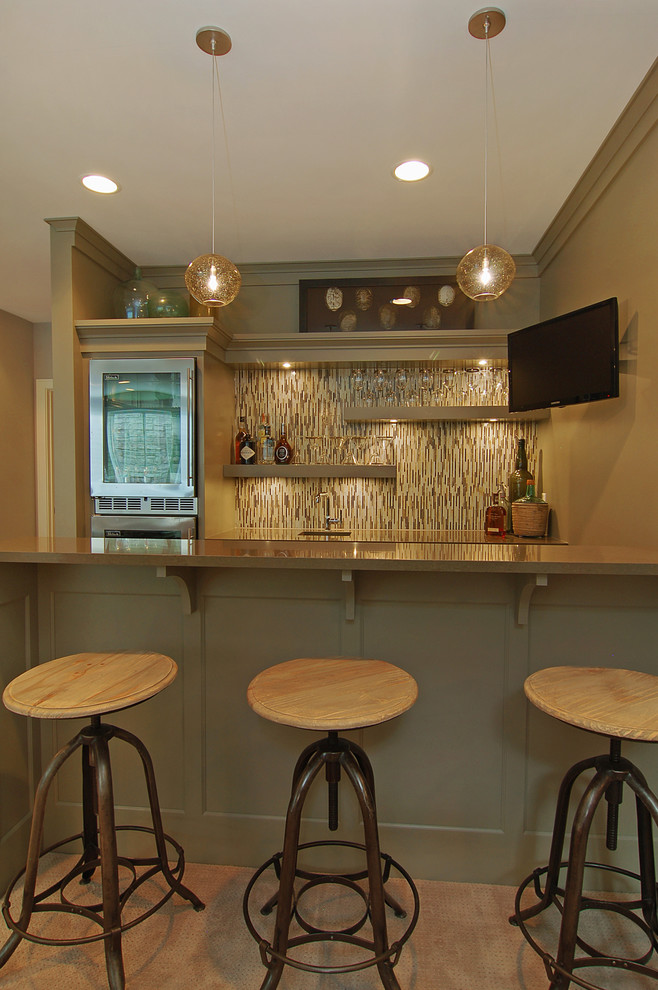 Design ideas for a mid-sized transitional galley seated home bar in Minneapolis with carpet, green cabinets, multi-coloured splashback and matchstick tile splashback.