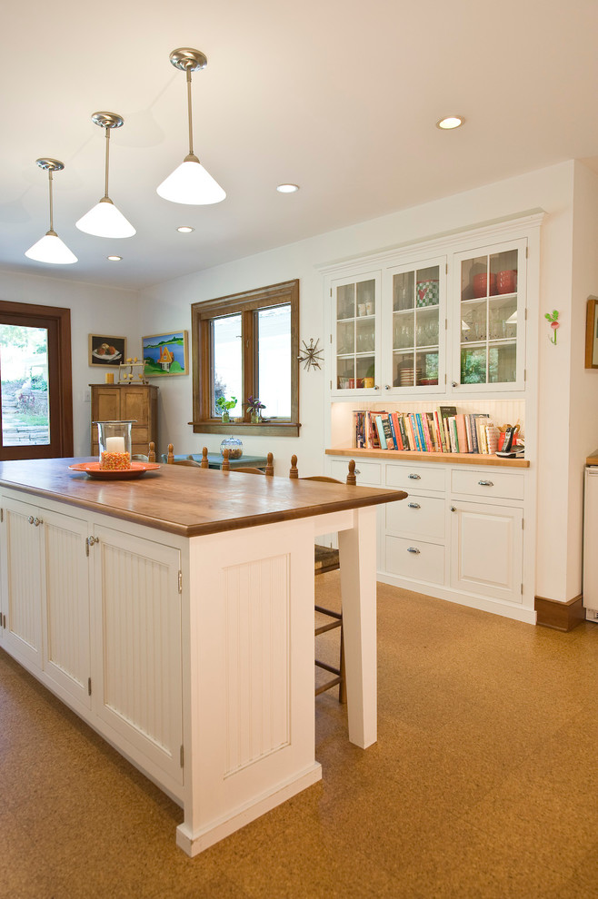 Inspiration for a kitchen in Philadelphia with cork floors.