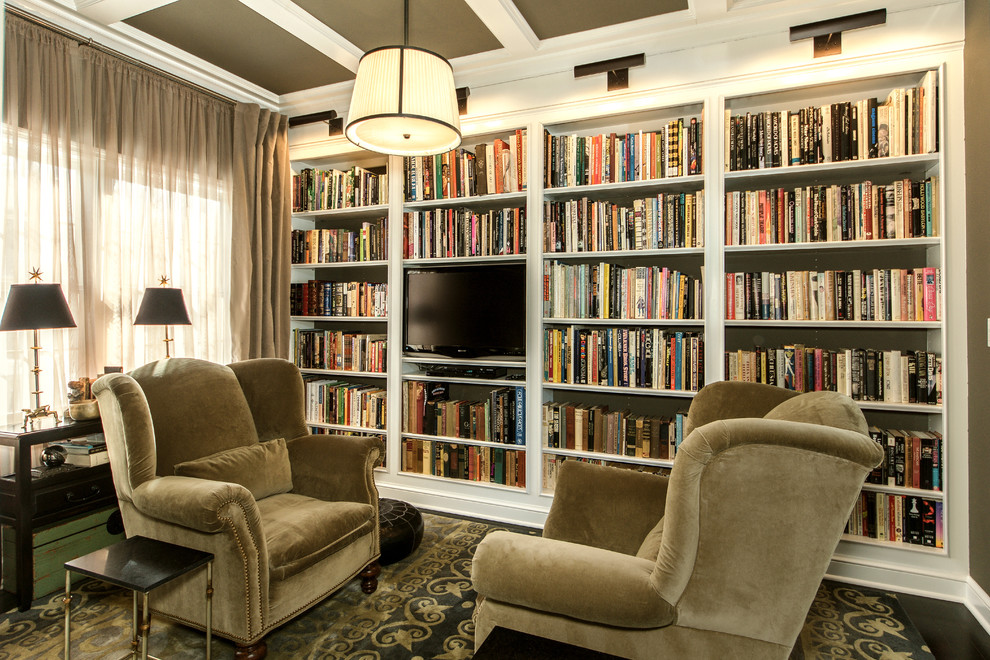 Design ideas for a small transitional home office in New York with a library, grey walls and dark hardwood floors.