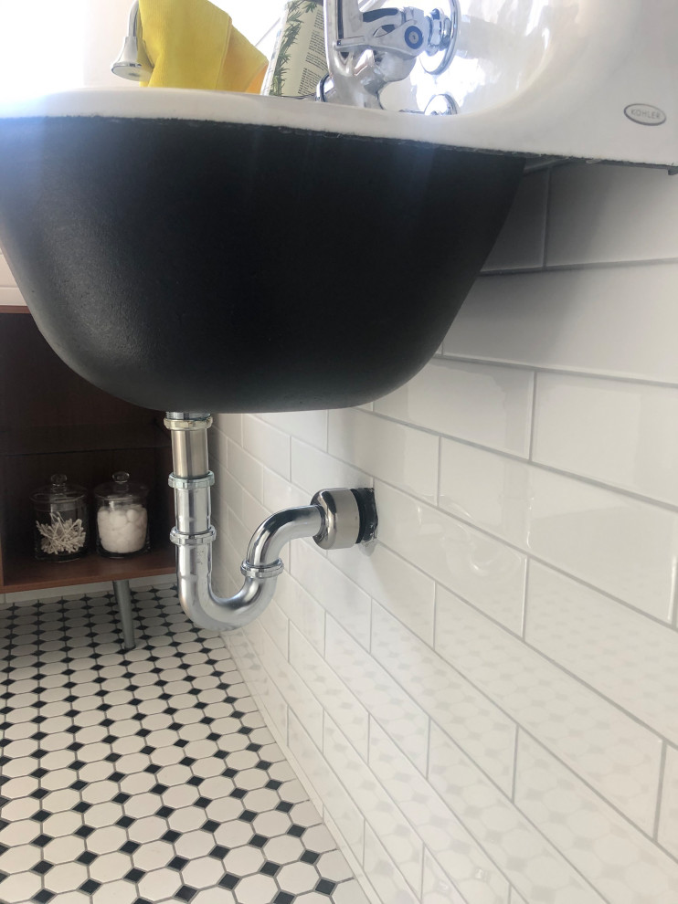 Escutcheon under bathroom sink