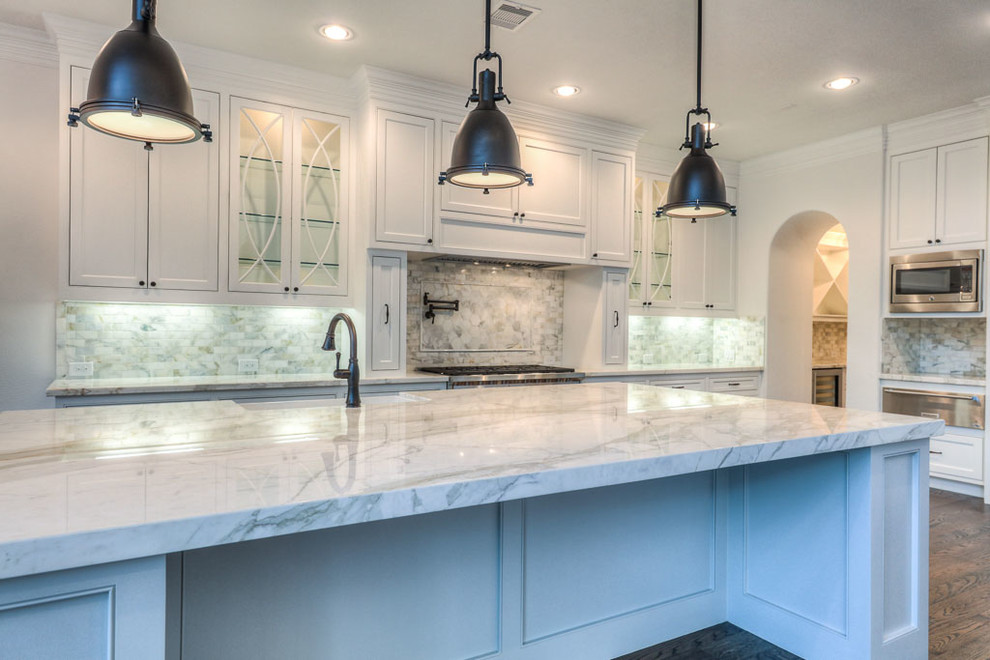 Example of a transitional kitchen design in Houston