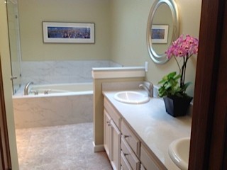 Transitional white tile and porcelain tile home design photo in Seattle with quartz countertops